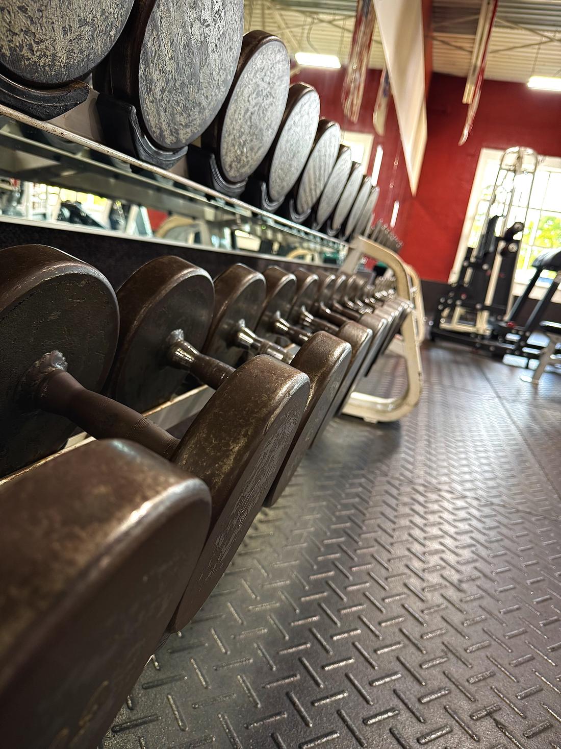 Dumbbell rack on the free-weight floor at Richmond Athletic Club
